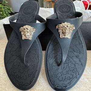 Versace, black sandals, with gold detail. SZ 7.